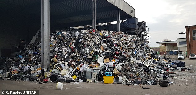 A shocking report reveals that the world generated 62 million tonnes of e-waste in 2022, including thousands of tonnes of discarded solar panels.  This image shows piles of waste awaiting recycling at a center in Germany
