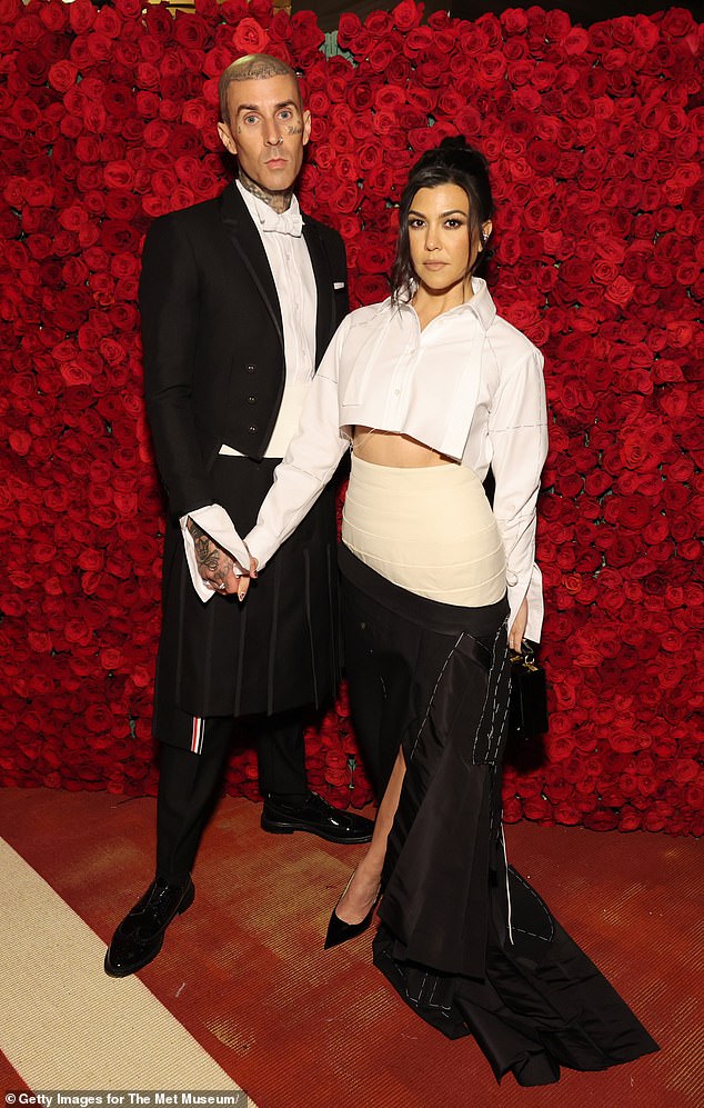 Travis Barker (pictured with wife Kourtney Kardashian) praised Qantas after traveling around Australia after overcoming his fear of flying following a fatal plane crash in 2008.