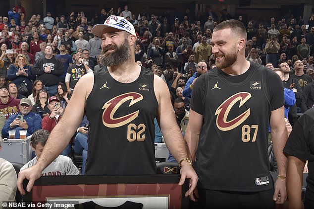 Jason Kelce and Travis Kelce are honored during the game between Cavs and Celtics