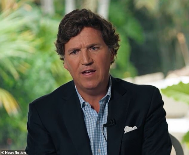 Tucker Carlson told Chris Cuomo he 'can't even guess' who killed Alexei Navalny during a confrontational interview with Cuomo hitting Carlson for asking Vladimir Putin softball questions