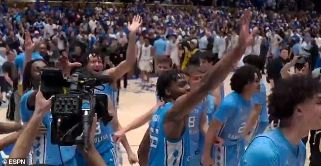 UNC players were splashed with water after taunting Duke fans and waving goodbye.