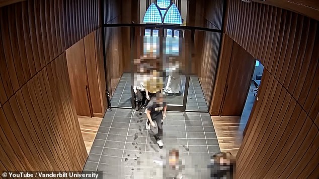 Security footage released by the 151-year-old university shows a swarm of protesters shoving a lone security guard at the building's front door.