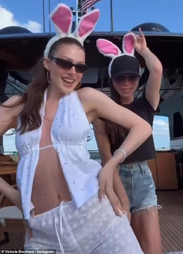 Victoria Beckham, 49, (right), showed off her teeth in a rare smile while celebrating Easter with daughter-in-law Nicola Peltz, 29, (left), on Saturday.