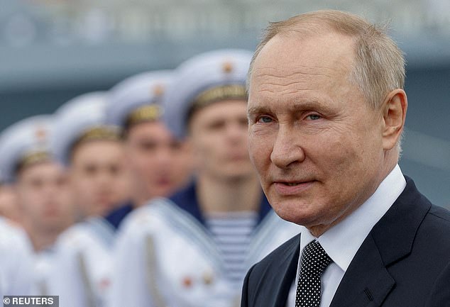 Vladimir Putin attends a parade marking Navy Day in Saint Petersburg, July 31, 2022