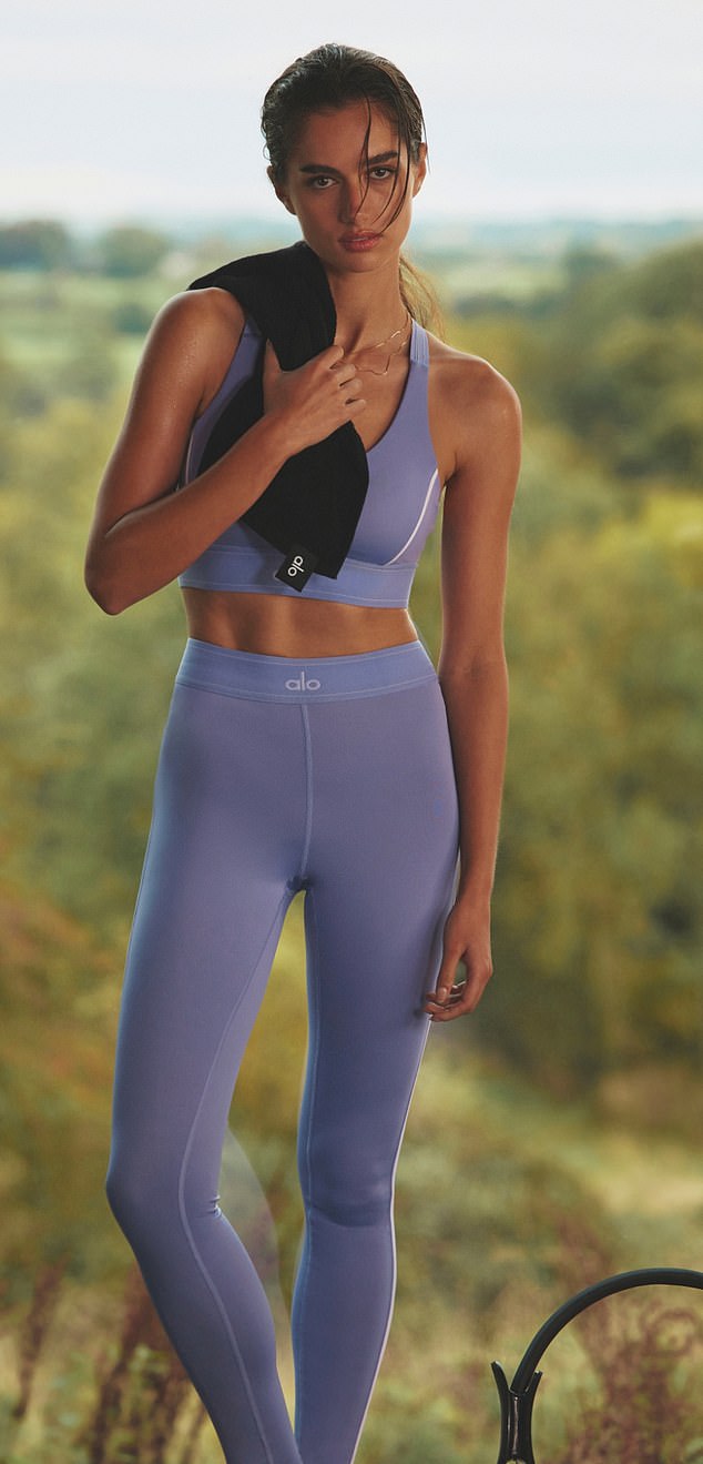 A model wears a lilac Alo Yoga bra, £75 and £140 leggings