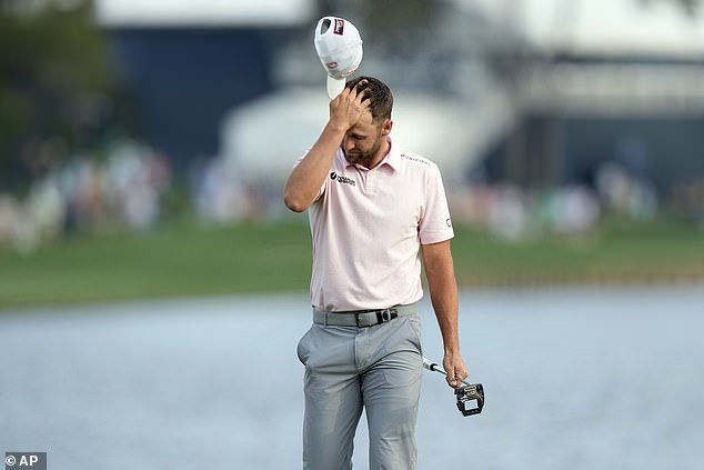 Wyndham Clark reacts after missing a birdie putt on the 18th hole during the final round