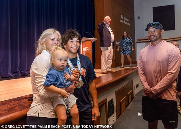 Tiger Woods and Elin Nordegren (with their second son, Arthur) reunited at their son Charlie's high school golf ceremony.