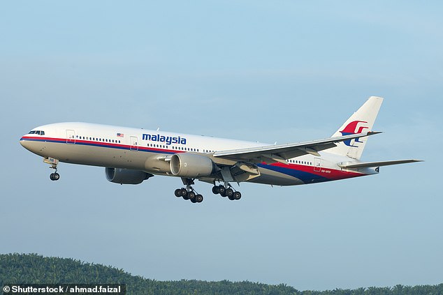MH370 was scheduled to fly from Kuala Lumpur to Beijing, but disappeared from radar shortly after takeoff. All 239 people on board were lost (file image of a Malaysia Airlines Boeing 777)