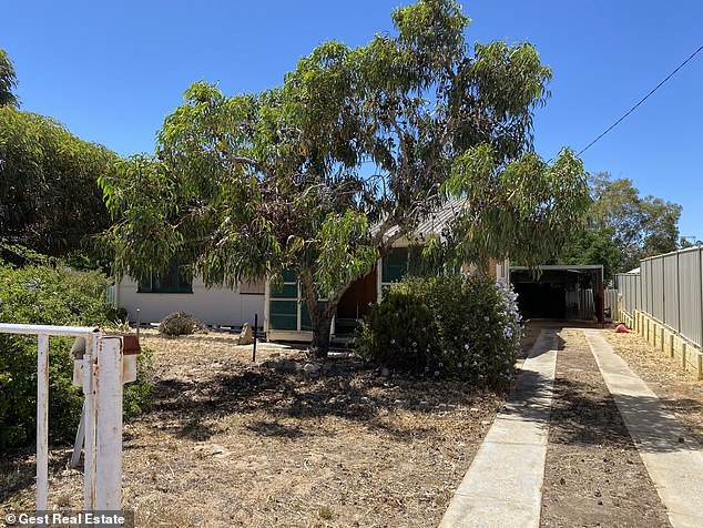 The three-bedroom home sold for just $22,000 because it contains asbestos, according to the listing.