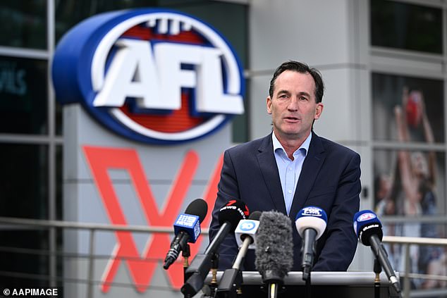 AFL boss Andrew Dillon is pictured addressing the media on Wednesday after the league was rocked by explosive allegations made in parliament.
