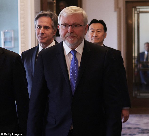 A question to Donald Trump highlighting previously negative comments Australian US Ambassador Kevin Rudd (center) made was orchestrated by News Corp.