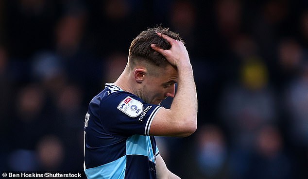 Wycombe's David Wheeler was sent off ten seconds after coming on as a substitute