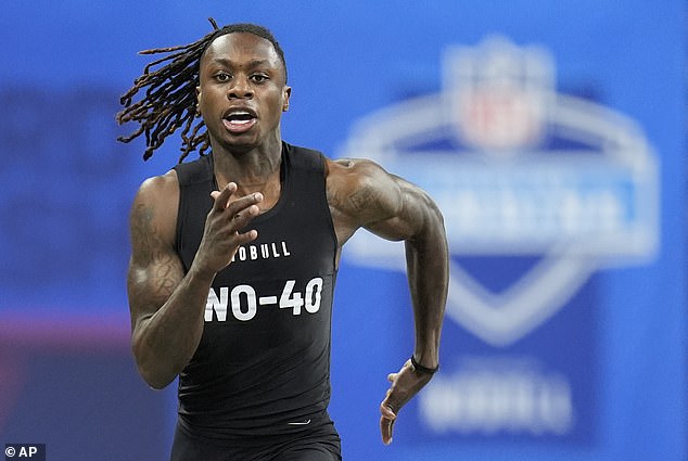 WR Xavier Worthy set the record for fastest 40-yard dash at the NFL Combine with a 4.21