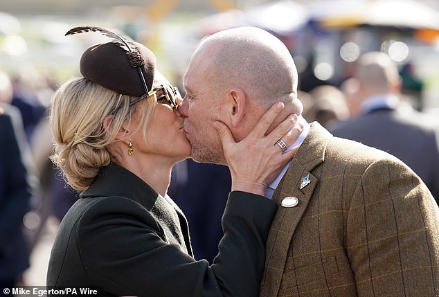 Zara Tindall and her husband Mike enjoyed another cheeky smooch as they arrived on the final day of Cheltenham