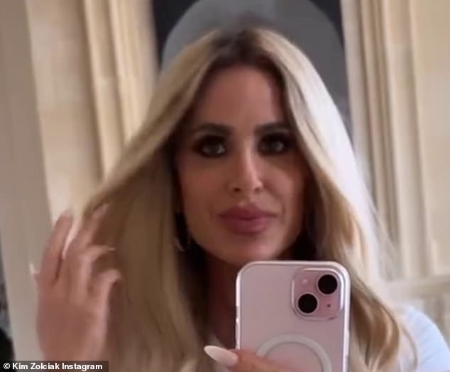 The Modere brand ambassador, who tousled her waist-length blonde hair extensions, is in the middle of a contentious divorce from her estranged second husband, Kroy Biermann, and the couple has defaulted on their mortgage and owes money to the IRS, credit cards and banks