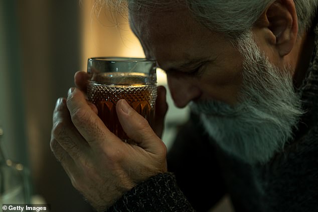 A survey conducted in May 2020 found that one in 10 older adults were drinking more each week than before, and that the odds of increased drinking were twice as high if a respondent reported loneliness or had symptoms of anxiety or depression (file image)