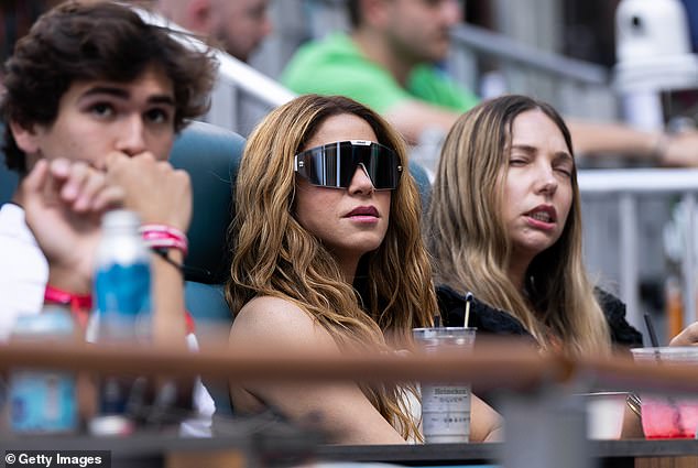 The hitmaker looked serious as she watched the nail-biting final.