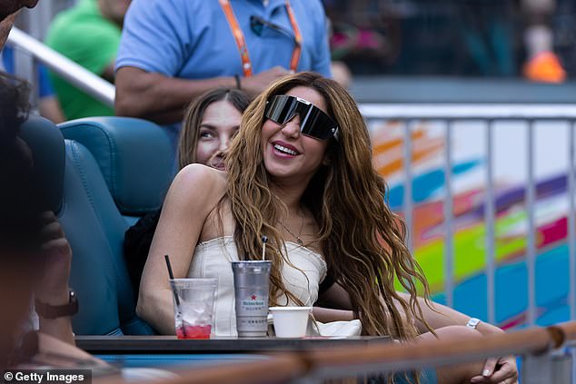 Shakira smiled as she enjoyed the day in the VIP section.