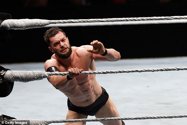 Lynch and Finn Balor (pictured) became closer after working together in Ireland before becoming global stars.