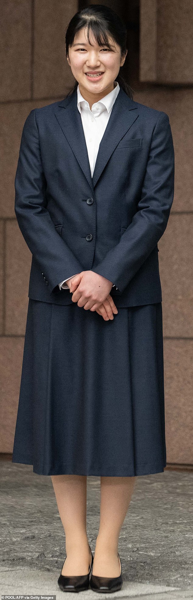 The daughter of Emperor Naruhito and Empress Masako, photographed outside the Japanese Red Cross building in Tokyo.