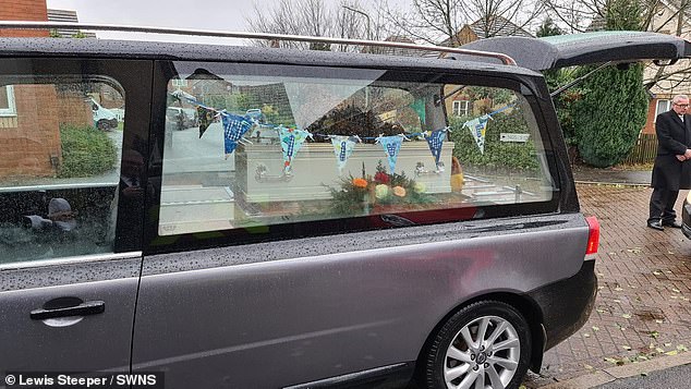 The photo shows the funeral that was held for baby Oliver after his death.