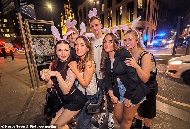 A group of friends arrived in the city of Newcastle wearing Easter bunny ears as they made the most of the last night before work tomorrow.