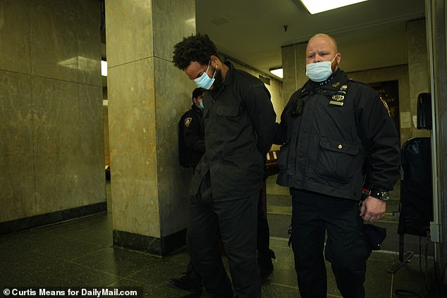 Pictured: Israel is arraigned in Manhattan Criminal Court on assault and robbery charges for punching and taunting a good Samaritan who tried to give him a coat in January 2022.