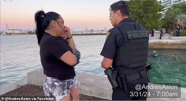 Officers spoke with two bystanders, who were standing on the boardwalk with an urn containing their father's ashes when Dominguez drove his car into the Atlantic.