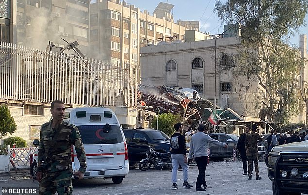 Smoke rises after what Iranian media said was an Israeli attack on a building near the Iranian embassy in Damascus.
