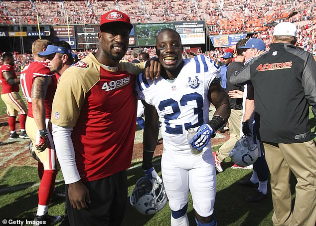 Vontae (right) was the younger brother of former Super Bowl champion Vernon (left)