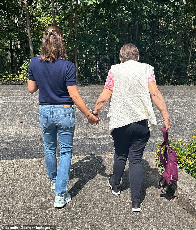Like mother, like daughter: The Daredevil star also shared a sweet photo of herself holding hands with her mother, Patricia Ann Garner.