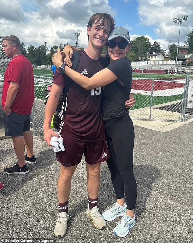 Showing support: The Juno actress looked positively petite in a photo with her little nephew at his soccer game.