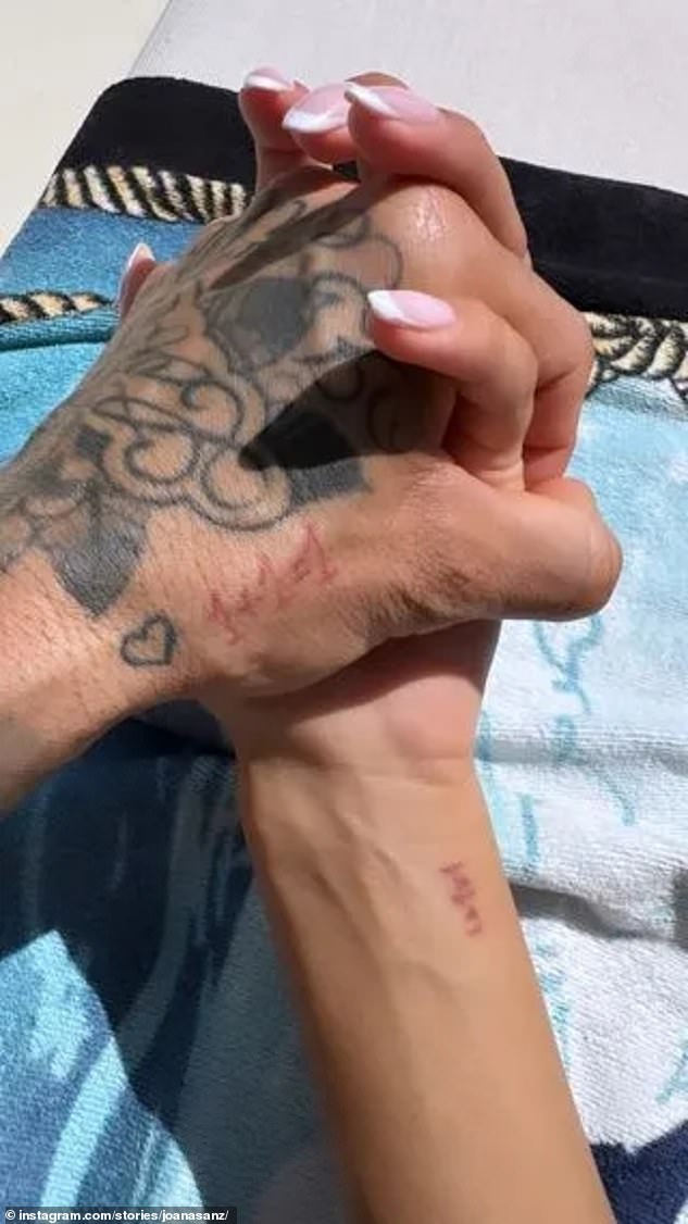 The Spanish model shared a photo on Monday of the couple holding hands, with what appeared to be 1+1=1 tattoos.