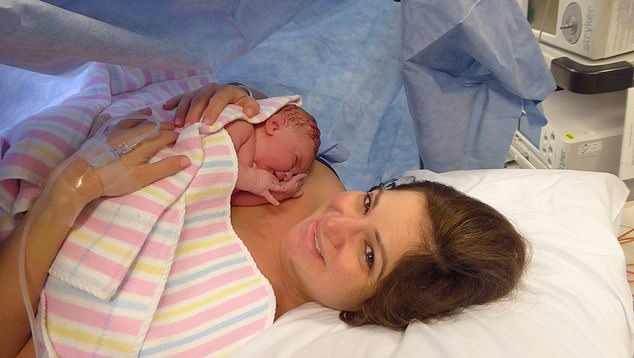 Nadine Lipworth is pictured with her daughter Sasha as a newborn baby.
