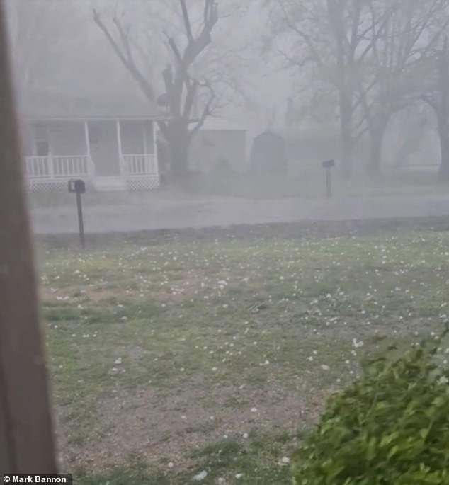 A resident of Caney, Kansas, captured hail thrown as large white chunks flung across a yard.  Strong winds also caused the mix of rain and hail to rise into the sky and onto roads.