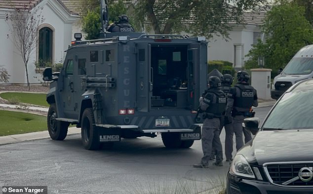 Police are seen attempting to raid Renner's family home to execute an arrest warrant earlier this month, only to find no one there.
