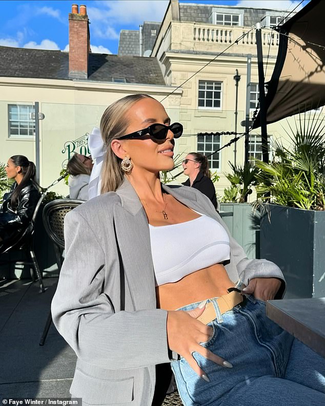 The Love Island star, 28, took to Instagram to show off her toned abs in the number which she teamed with a pair of jeans and a stylish oversized gray jacket.