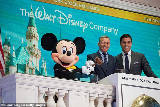 Cole's appearance in high-level talks is yet another headache for embattled Disney CEO Bob Iger (center)