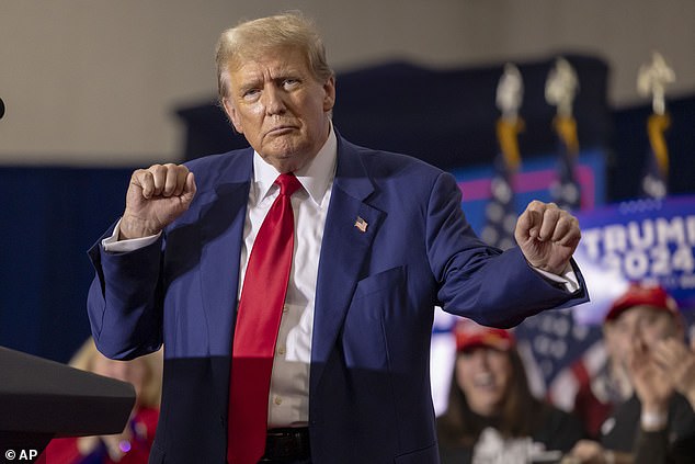 Trump dances a little after speaking in Green Bay, where he attacked Biden on immigration, crime, the economy, electric vehicles and challenged Biden to a debate.
