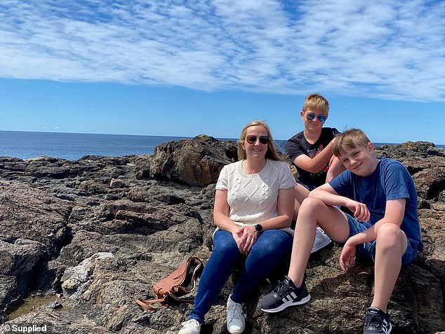 Alysia Sheppard, a 44-year-old single mother of two teenage children (pictured left with Oliver and Harrison) who lives on Sydney's northern beaches, recently used Afterpay to buy groceries, despite earning a salary of six. numbers and relying on Airtasker to find extra work doing things like cleaning
