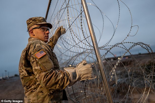 To help prevent immigrants from seeking asylum en masse after entering illegally, Texas National Guard soldiers are placing even more fencing along the border barrier in El Paso, Texas.
