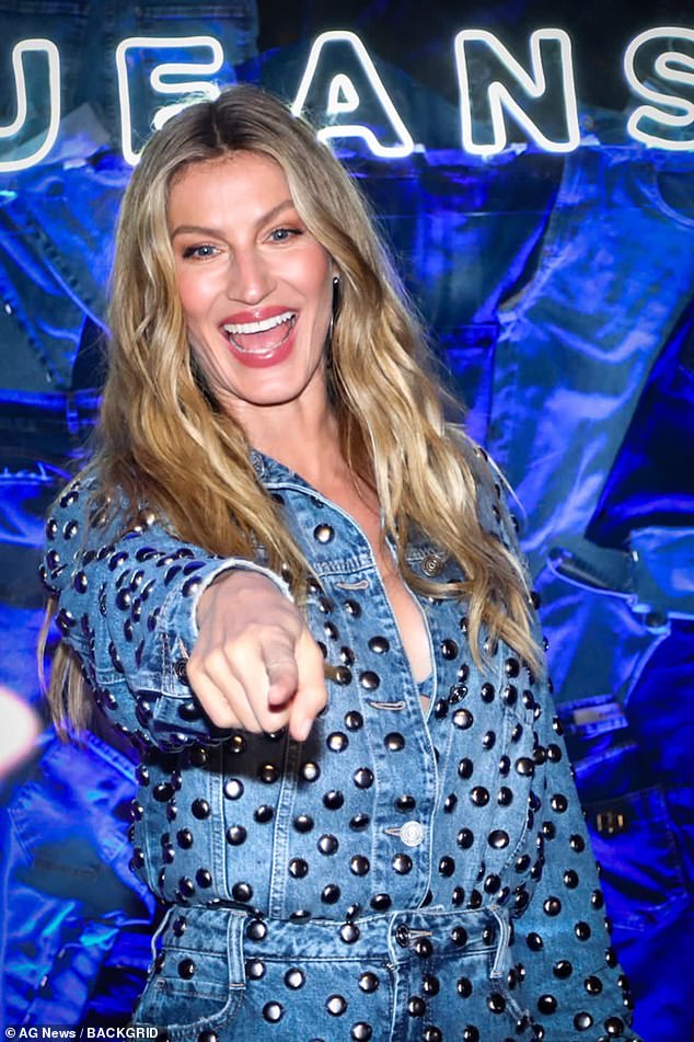 For the occasion, the 43-year-old supermodel went shirtless under a studded denim jacket tucked into matching jeans.
