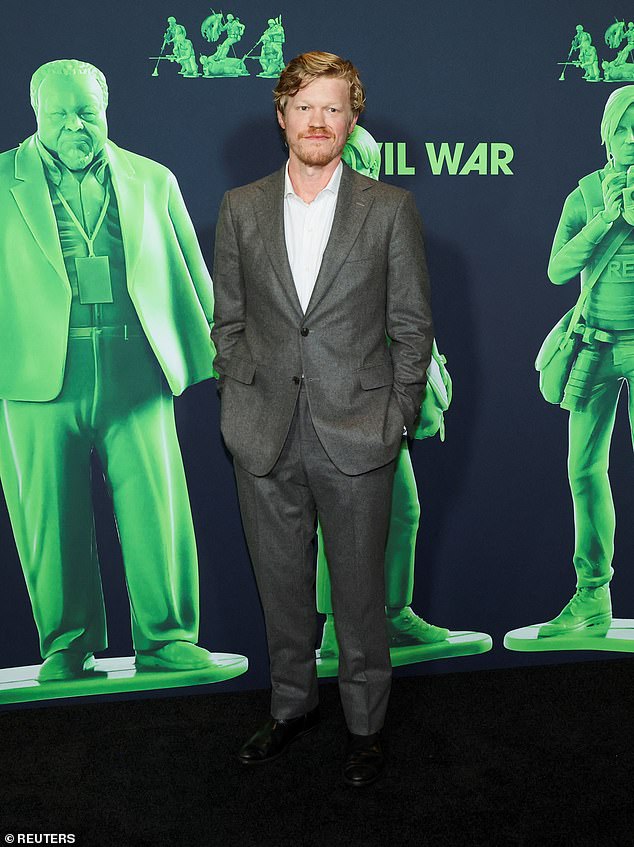 Jesse looked dapper in a gray tweed suit paired with a white button-down shirt and black leather dress shoes.