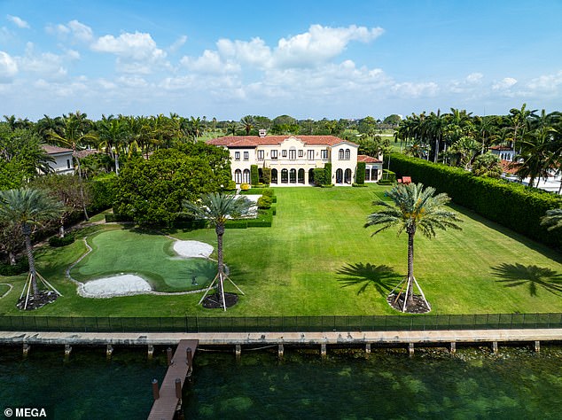 Photos acquired exclusively by DailyMail.com show that the beachfront property on the strictly gated island features a large front garden and an outdoor pool.