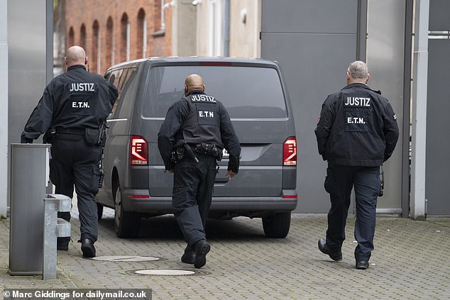 Brueckner arrived early Wednesday at the Braunschweig court under a heavy police escort.