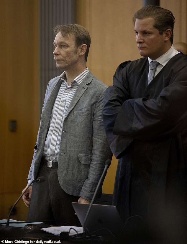 Dressed in his now trademark blazer and jacket, Brueckner was led into court in handcuffs and shook hands with his legal team before being seated.