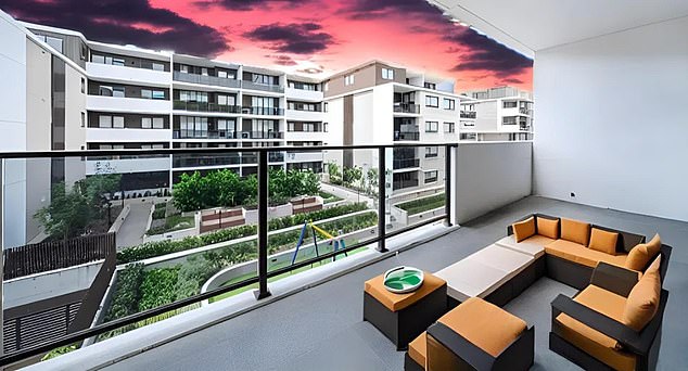Images of the two-bedroom apartment in Jerralong Drive, Schofields, in Sydney's west, show a 'fake' sunset in the distance and a strange computer-generated outdoor lounge located on the balcony.