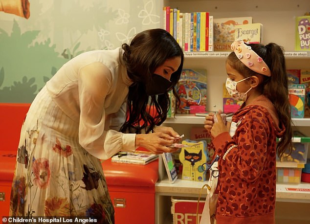 Meghan is seen interacting with children during the story session at Children's Hospital