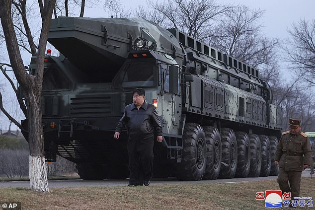 The North Korean dictator was seen posing in front of the Hwasong-16B