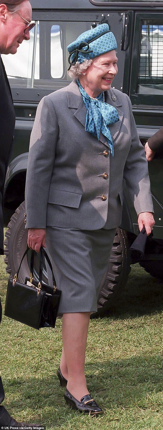 Elizabeth is pictured wearing the brooch, believed to have originally belonged to Queen Mary of Teck, in 1997.